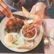 A breakfast plate with eggs and toast at one of San Diego's best breakfast spots