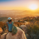 Woman taking in a beautiful view of the sunset on one of San Diego's hiking trails