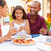 A family enjoying dinner at one of the many family friends restaurants in San Diego