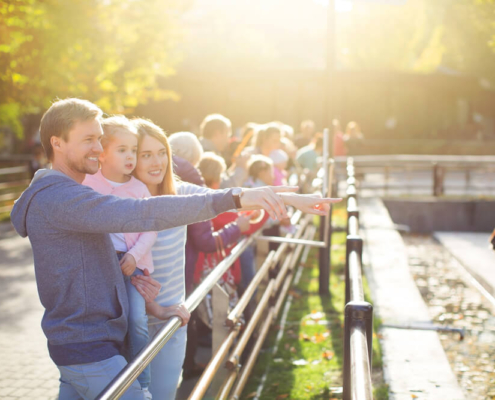 A family at the San Diego Zoo in winter