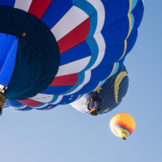 Three hot air balloons over San Diego