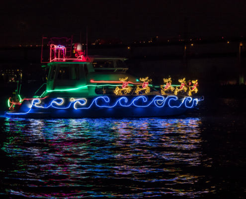 A boat lit up for the San Diego Bay Parade of Lights, one of San Diego's premier events