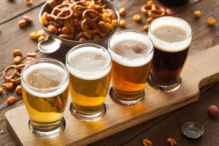 Picture of a flight of beers on a table from a local San Diego brewery