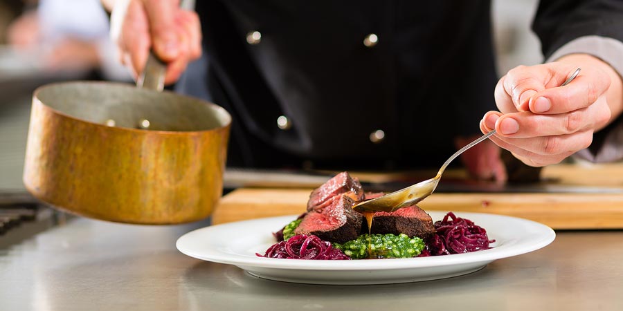 san-diego-personal-chefs-pouring-sauce San Diego vacation rental personal chefs